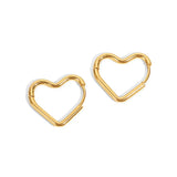 A pair of 14K gold plated minimalist heart hoop earrings with hinged closures, isolated on a white background.