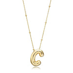 A shiny 18K gold plated 3D puff initial letter C pendant on a bean chain, isolated on a white background.