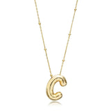 A shiny 18K gold plated 3D puff initial letter C pendant on a bean chain, isolated on a white background.