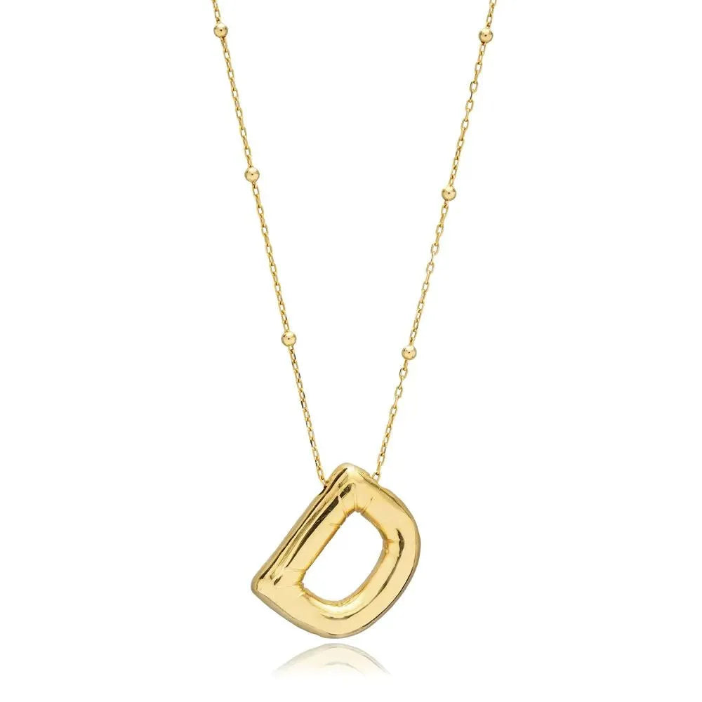 A shiny 18K gold plated 3D puff initial letter D pendant on a bean chain, isolated on a white background.