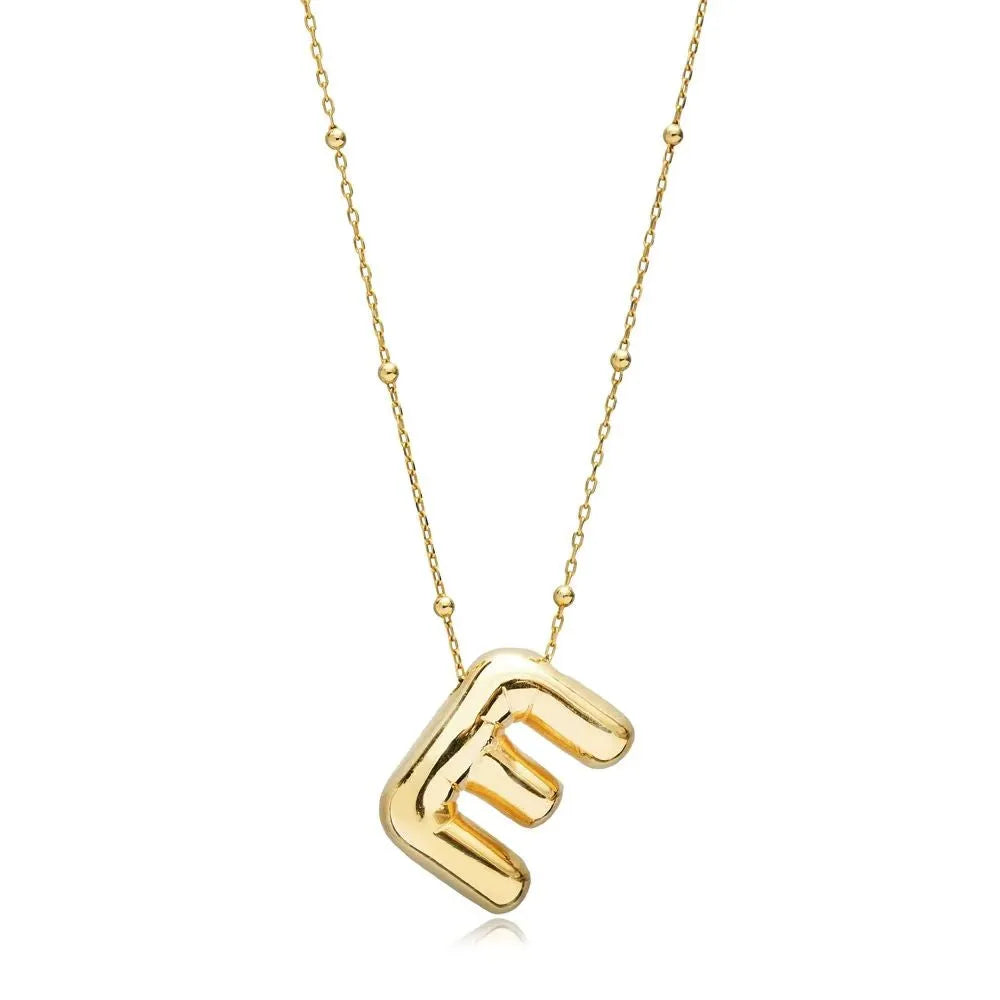 A shiny 18K gold plated 3D puff initial letter E pendant on a bean chain, isolated on a white background.