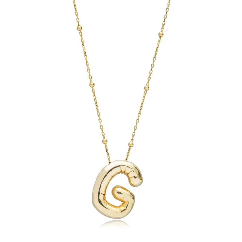 A shiny 18K gold plated 3D puff initial letter G pendant on a bean chain, isolated on a white background.