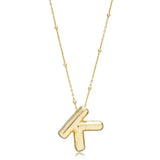 A shiny 18K gold plated 3D puff initial letter K pendant on a bean chain, isolated on a white background.