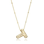 A shiny 18K gold plated 3D puff initial letter T pendant on a bean chain, isolated on a white background.