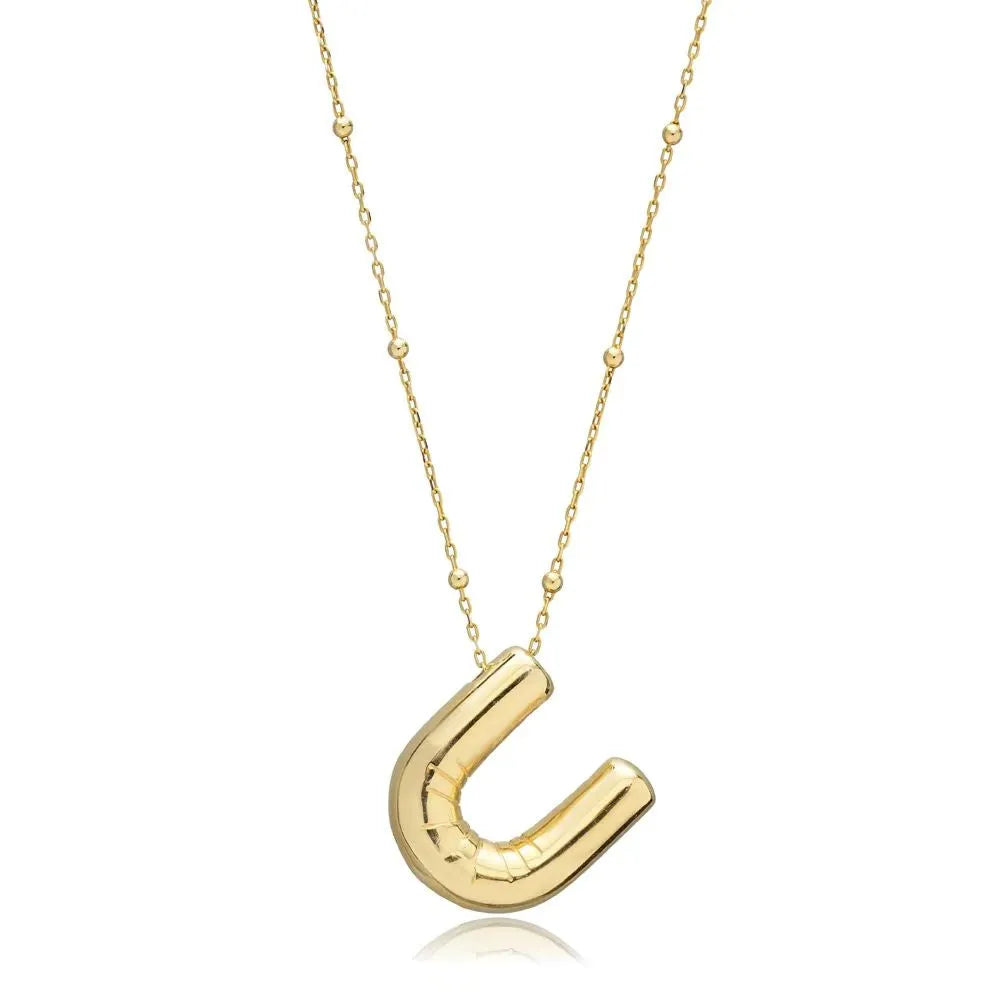 A shiny 18K gold plated 3D puff initial letter U pendant on a bean chain, isolated on a white background.