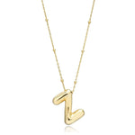 A shiny 18K gold plated 3D puff initial letter Z pendant on a bean chain, isolated on a white background.