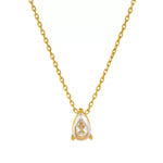 Flat lay of a single 18k gold plated dainty chain necklace featuring a solitary, delicate pear (teardrop) cut simulated gemstone pendant.
