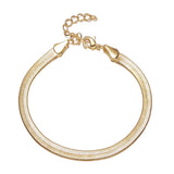 Isolated product image of a classic 18K gold-plated flat herringbone bracelet on a white background.