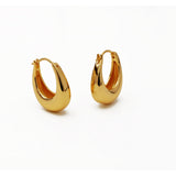 A pair of chunky 18k gold plated U-shape hoop earrings displayed against a plain white background.