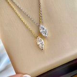 18k gold and platinum plated silver marquise cut necklaces side by side