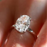 Macro view of the unique facet pattern and brilliant fire of the 3 ct oval ice-flower cut lab diamond, emphasizing D VVS2 purity.