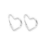 A pair of 925 sterling silver minimalist geometric heart hoop earrings, isolated on a white background.