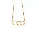 Gold necklace with three interlocking heart-shaped pendants on a white background