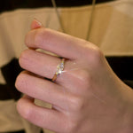 A model wearing the 18K gold Stardust Marquise Ring, highlighting its modern silhouette and elongated look.