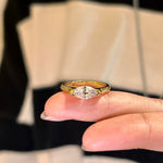 A model wearing the 18K gold Stardust Marquise Ring, highlighting its modern silhouette and elongated look.