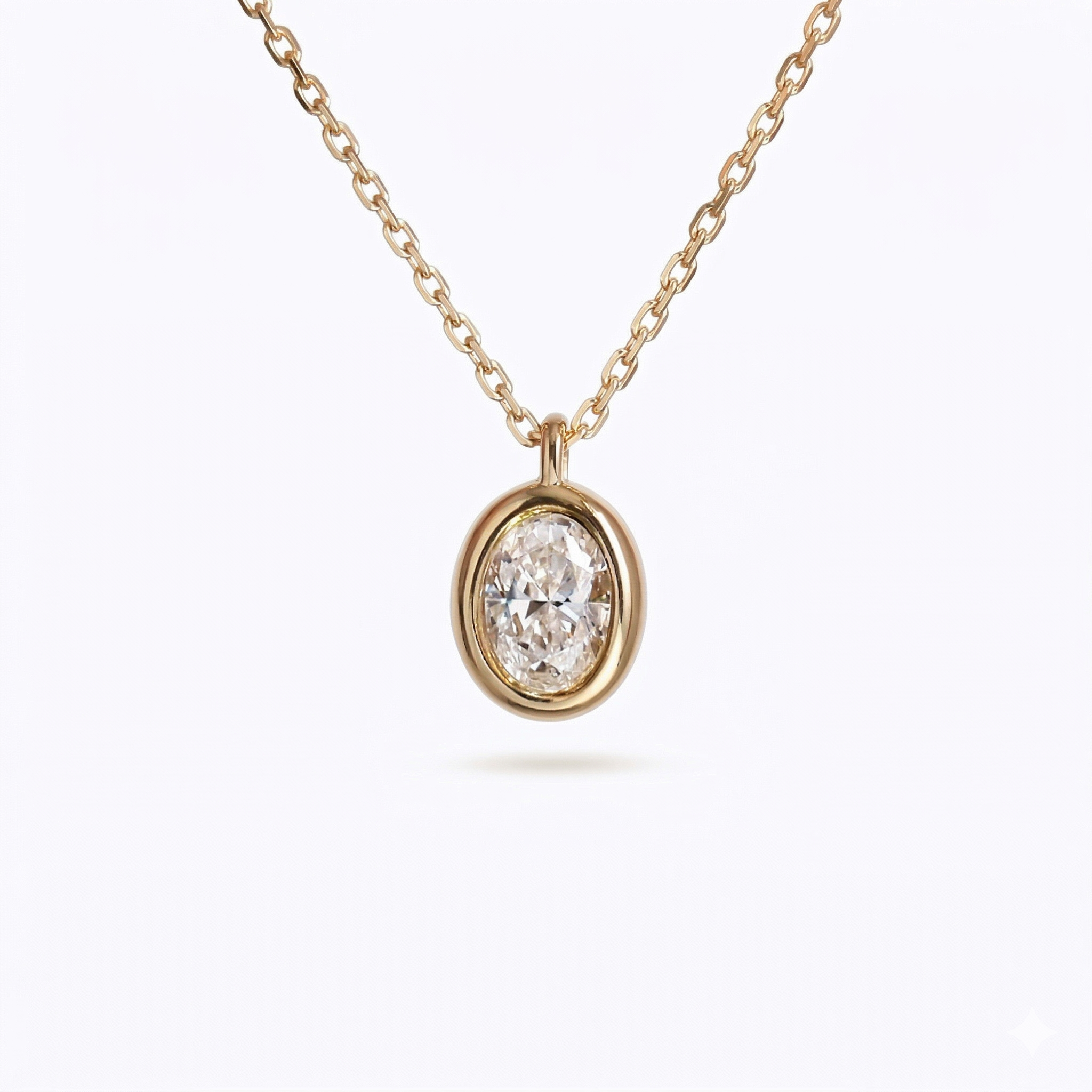 A striking close-up of the Bubble Luxe oval lab diamond necklace in a thick 18K gold bezel setting against a black background.