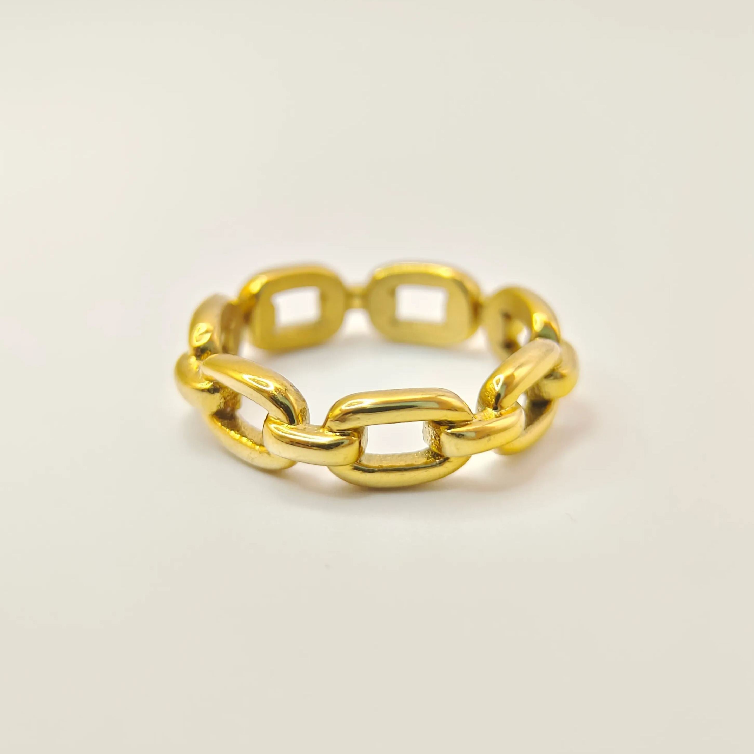 High-polish 18K gold plated chain link ring showing intricate geometric detail on a white background.