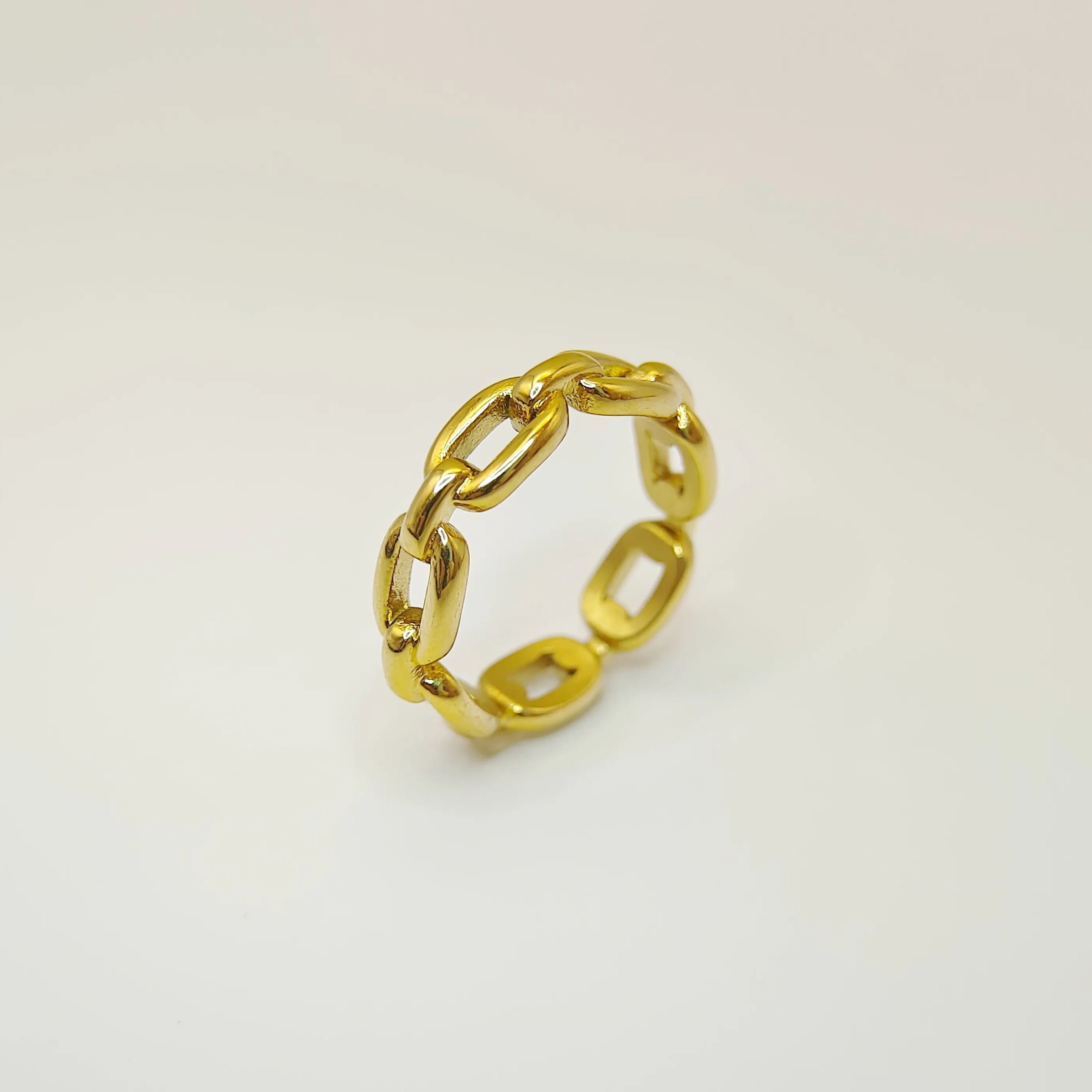 High-polish 18K gold plated chain link ring showing intricate geometric detail on a white background.