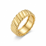 Angled view of a thick gold dome ring showcasing its textured, ribbed surface and high-polish finish on a white background.