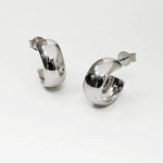 Chunky polished dome hoop earrings crafted from hypoallergenic S925 sterling silver, available in 18k gold plated and silver finishes.