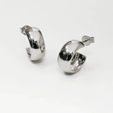 Chunky polished dome hoop earrings crafted from hypoallergenic S925 sterling silver, available in 18k gold plated and silver finishes.