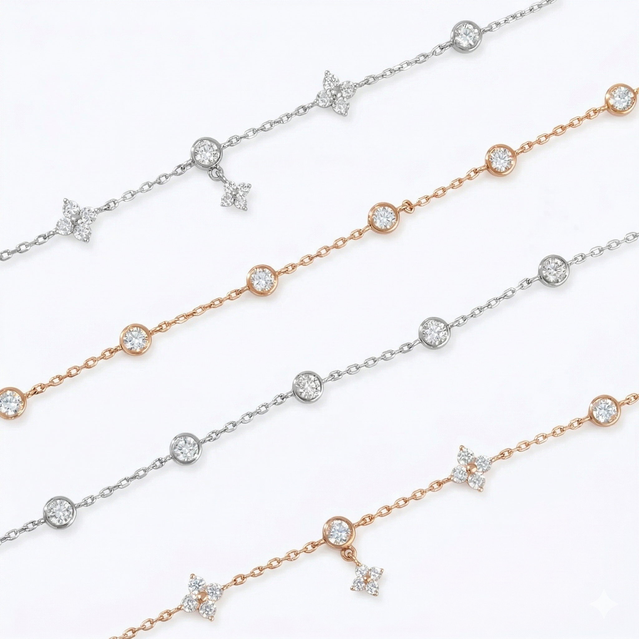 A collection of dainty clover charm bracelets in 14K rose gold plated and 925 sterling silver laid diagonally on a white surface.