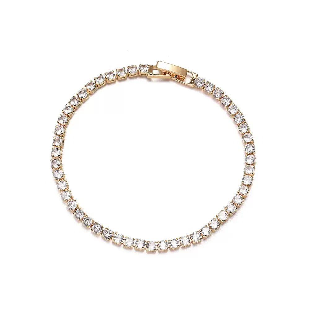 A full circular view of a 18K gold-plated diamond tennis bracelet showing the secure clasp and continuous stone setting.