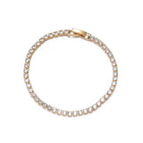 A full circular view of a 18K gold-plated diamond tennis bracelet showing the secure clasp and continuous stone setting.