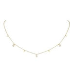 18K gold plated Glisten Gemstone station necklace isolated on a clean white background.