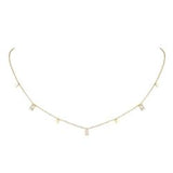 18K gold plated Glisten Gemstone station necklace isolated on a clean white background.