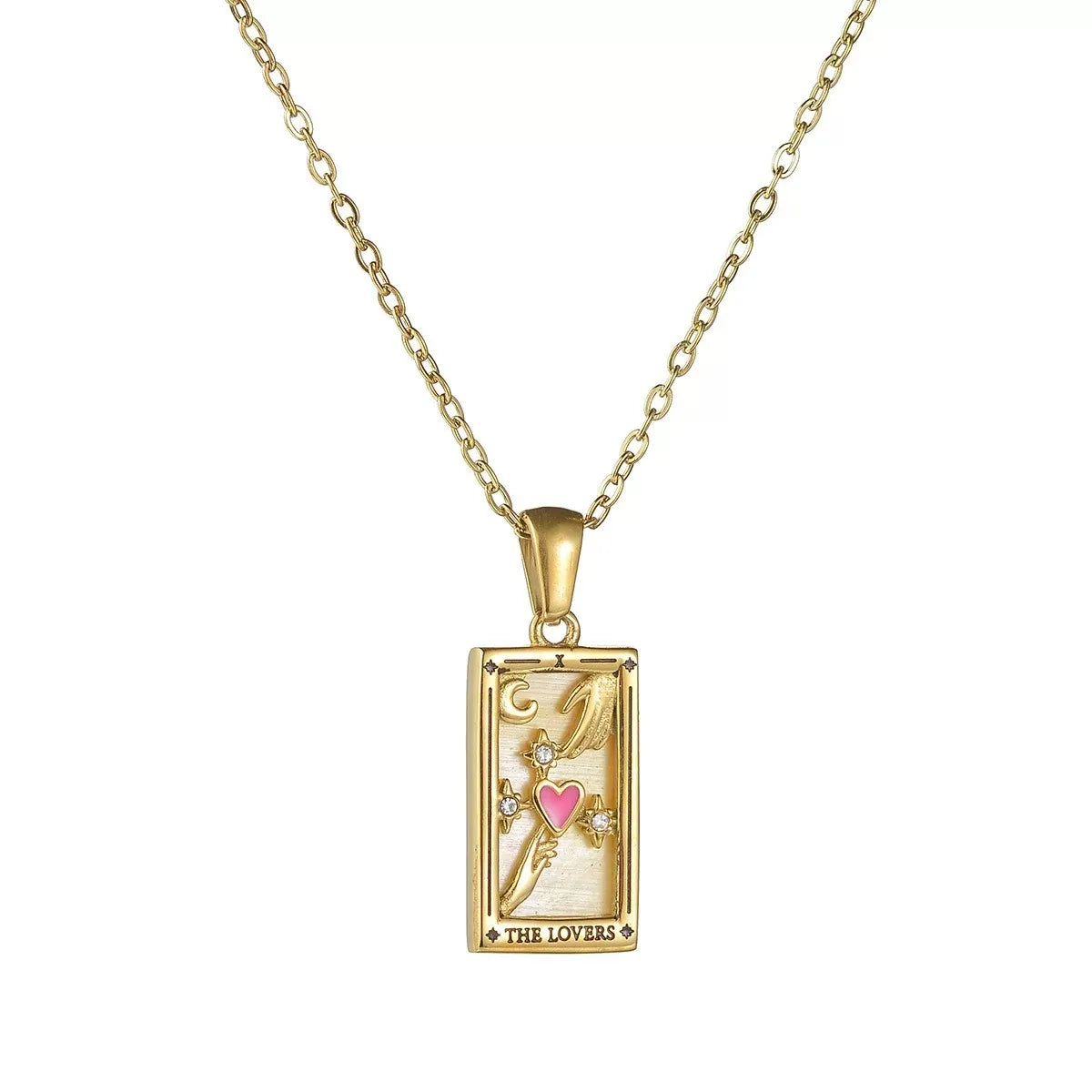 A gold rectangular tarot card pendant labeled THE LOVERS, featuring a white enamel background, gold hands reaching towards a central pink heart accented with clear stones.