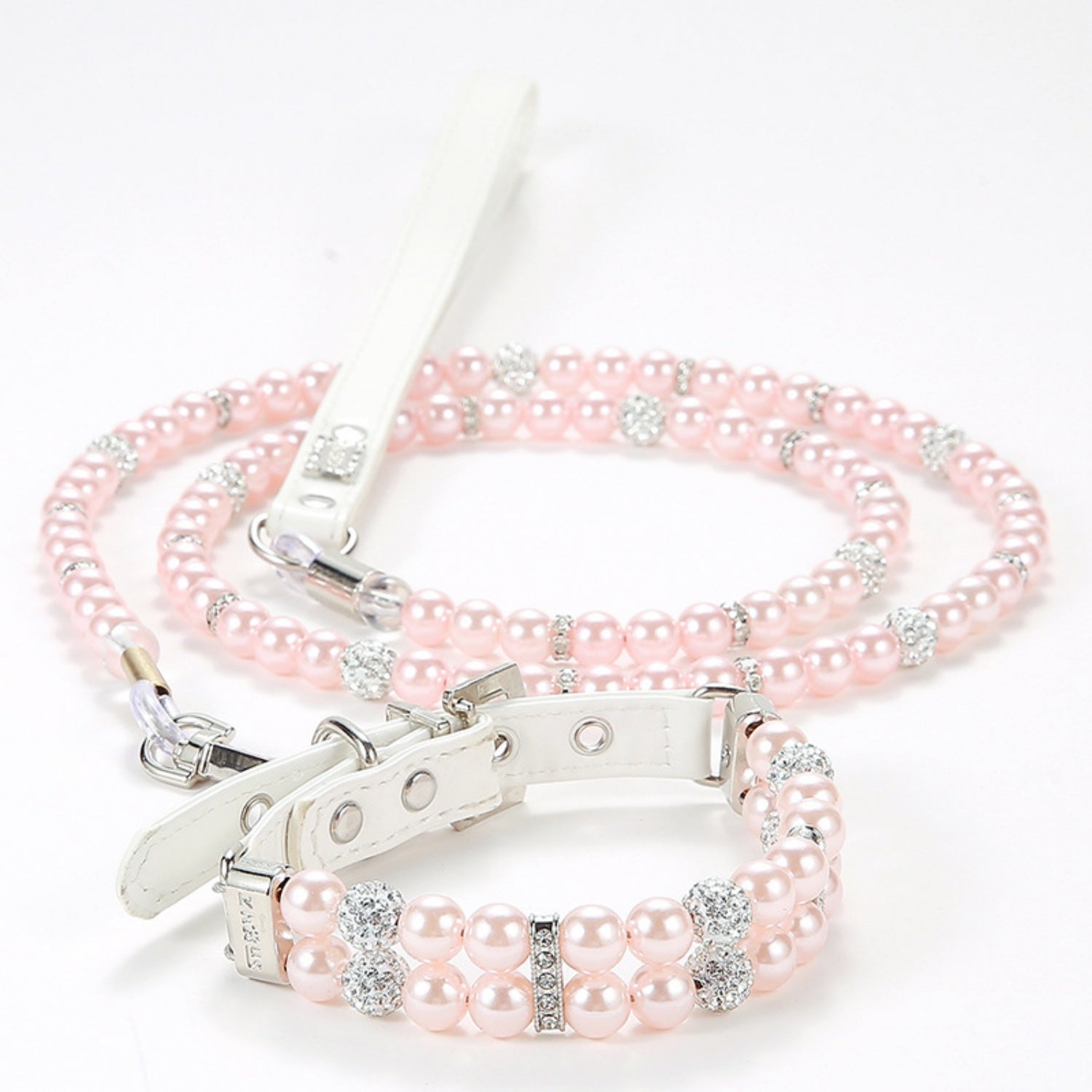 A delicate light pink simulated pearl pet collar paired with a matching pink pearl leash.