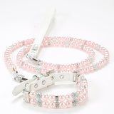 A delicate light pink simulated pearl pet collar paired with a matching pink pearl leash.