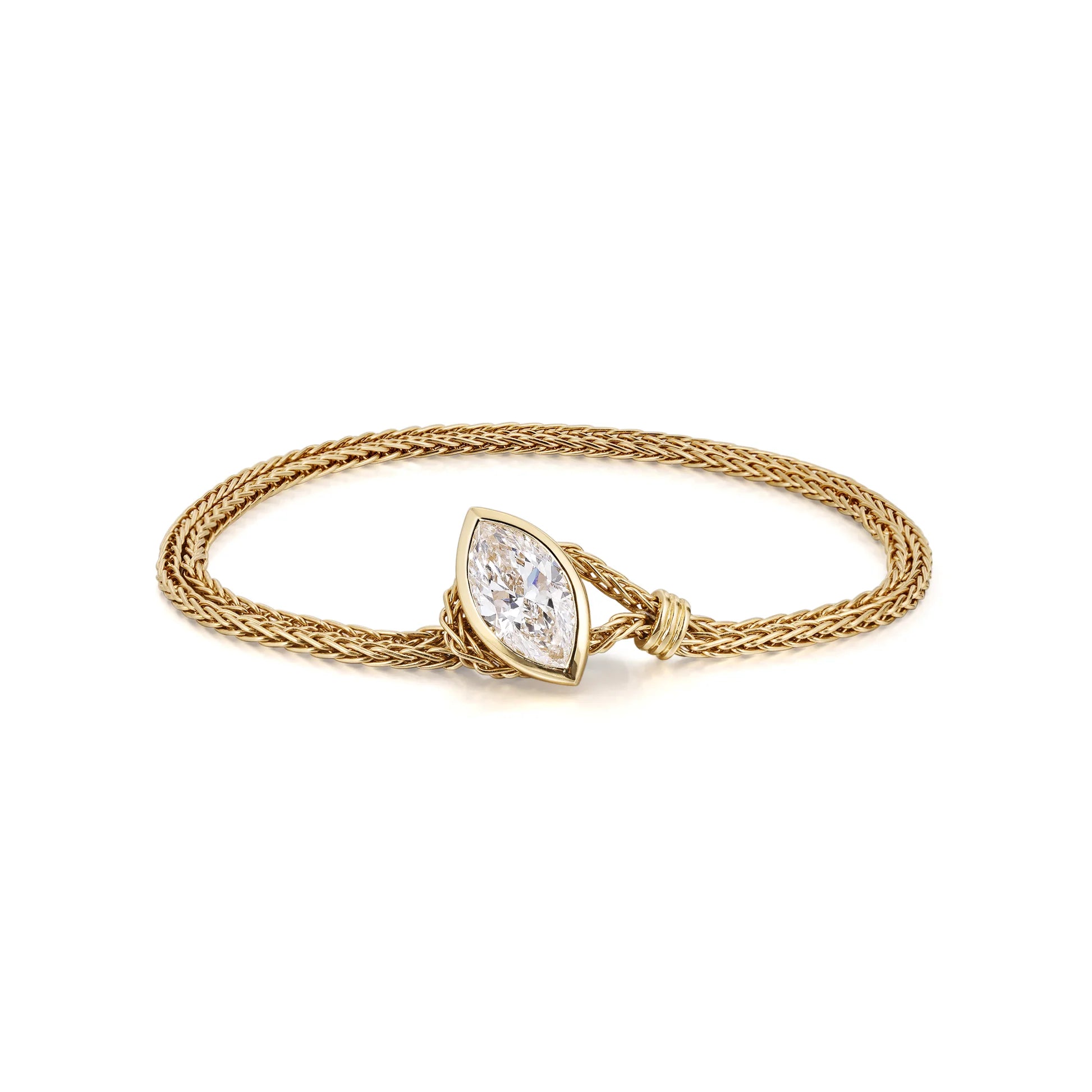 18K solid gold flexible wrap bracelet featuring a 1 carat marquise lab diamond, shown looped as it would sit on the wrist.