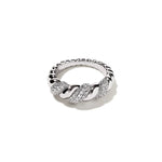 A high-end product shot of a 925 sterling silver twist link ring with sparkling pavé gemstone sections.