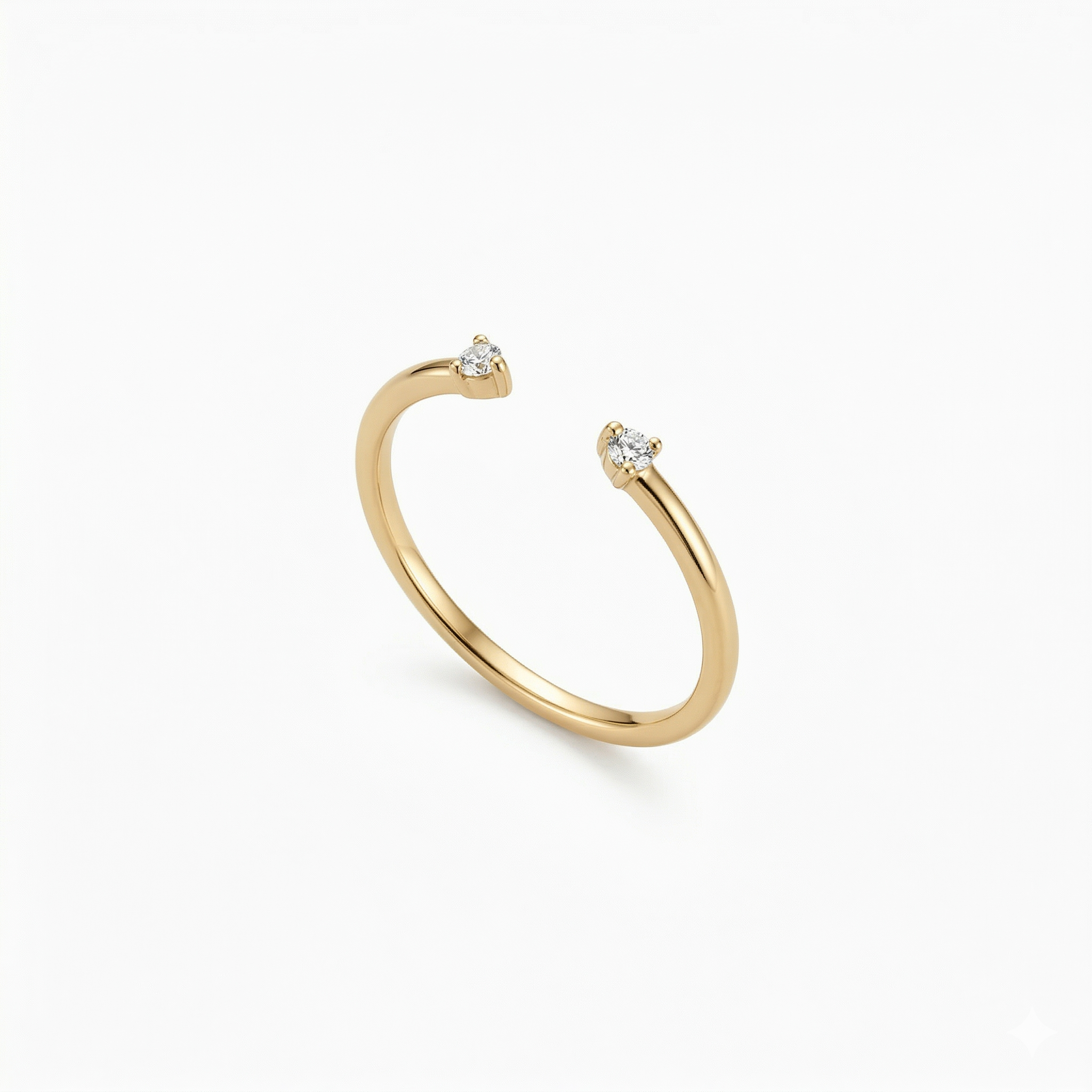 A high-quality product shot of a minimalist 18K gold-plated open cuff gap ring with two sparkling stones.
