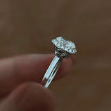 Side profile of the Stella Crown ring, showcasing the elegant open-gallery cathedral setting in solid PT950 platinum.