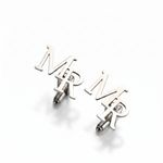 Silver 'MR' cufflinks on a white background