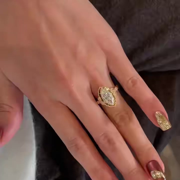 A short clip demonstrating the exceptional brilliance and sparkle of the VVS2 lab-grown marquise diamond ring under light.