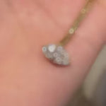 A dynamic video highlighting the flexibility of the 18K gold woven chain and the exceptional sparkle of the 1ct marquise lab diamond.