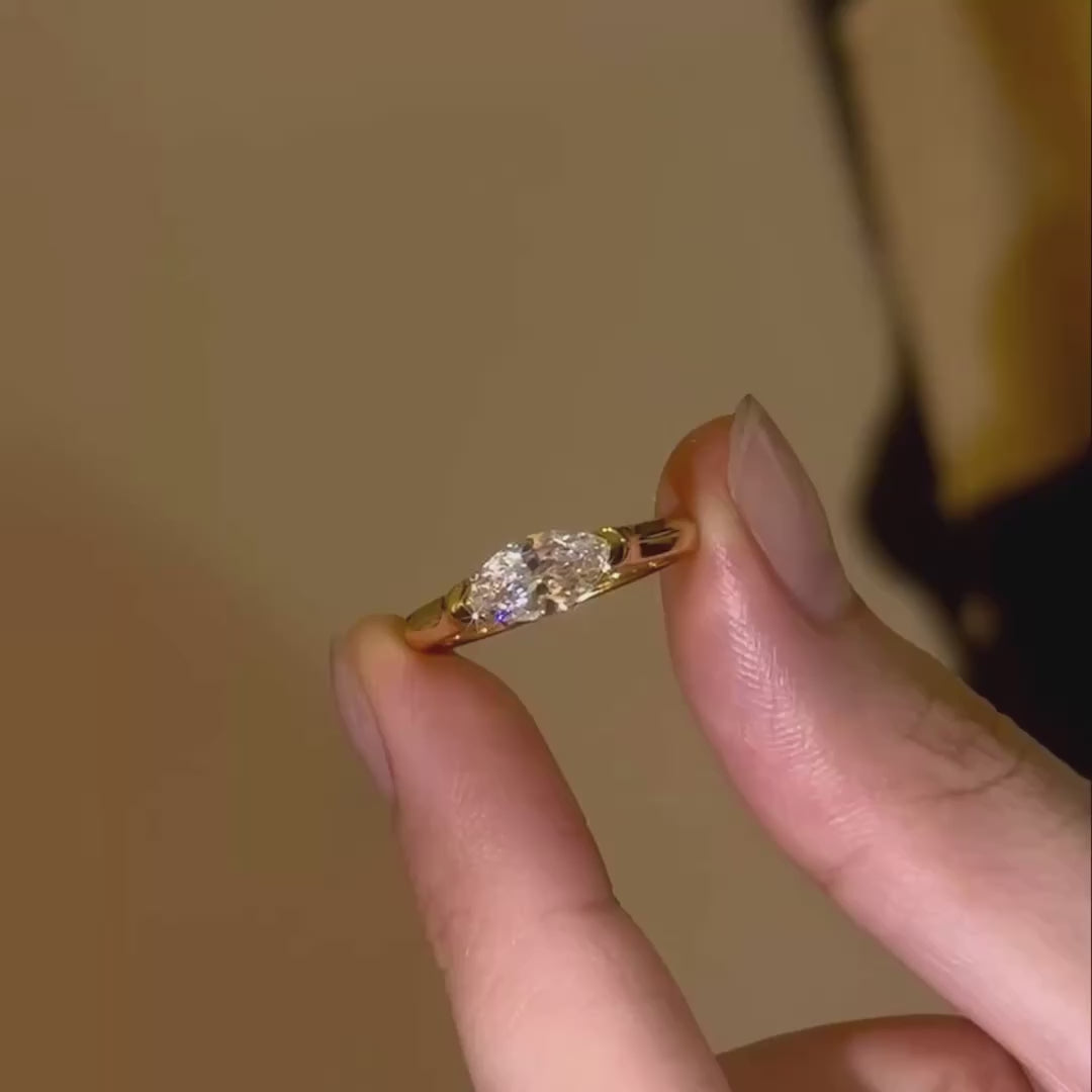 A video showcasing the exceptional light return and rainbow fire of the VVS1 marquise diamond under cinematic lighting.