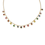 A delicate gold-plated sterling silver necklace with dangling rainbow-colored 3A cubic zirconia stones isolated on a white background.