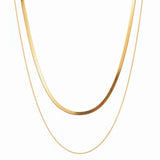 Clean product shot of the 18K gold double layer snake and herringbone chain on a white background.