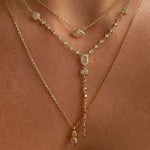 Model wearing the complete 3-piece Trinity Gemstone Layering Necklace Set in 18K gold.