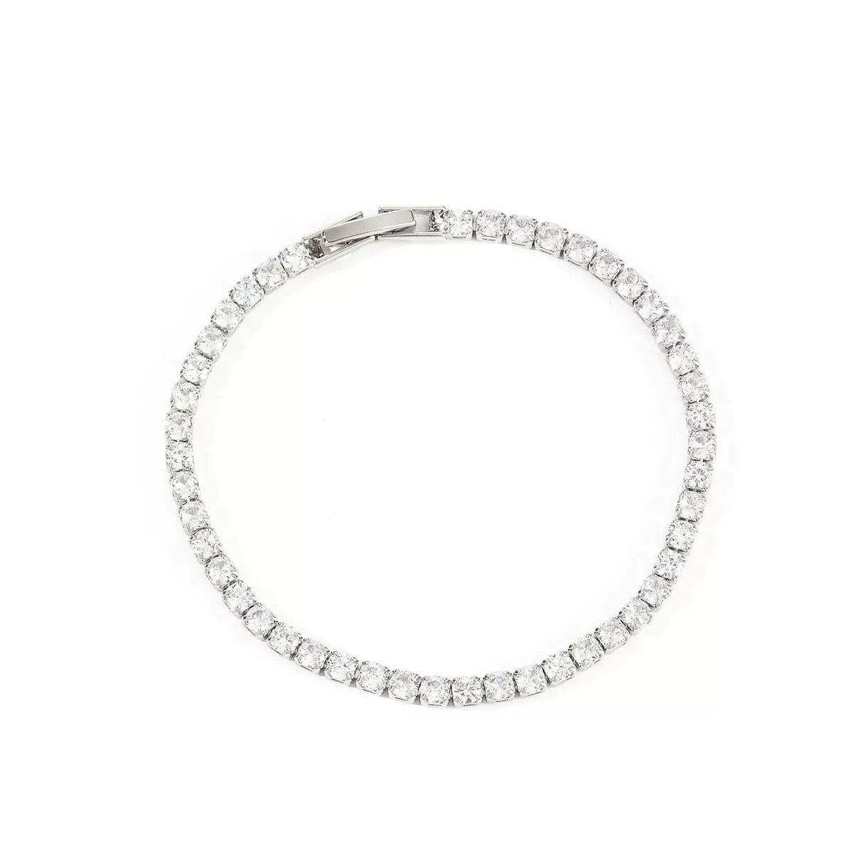 Top-down product photograph of a sleek white gold diamond tennis bracelet on a clean white background.