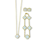 An elegant 18K gold plated jewelry set featuring a black four-leaf clover necklace, matching bracelet, and stud earrings laid on a white background.
