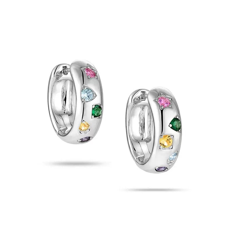 A pair of 14K white gold-plated huggie earrings featuring a variety of colorful gemstones in heart, star, and round shapes.
