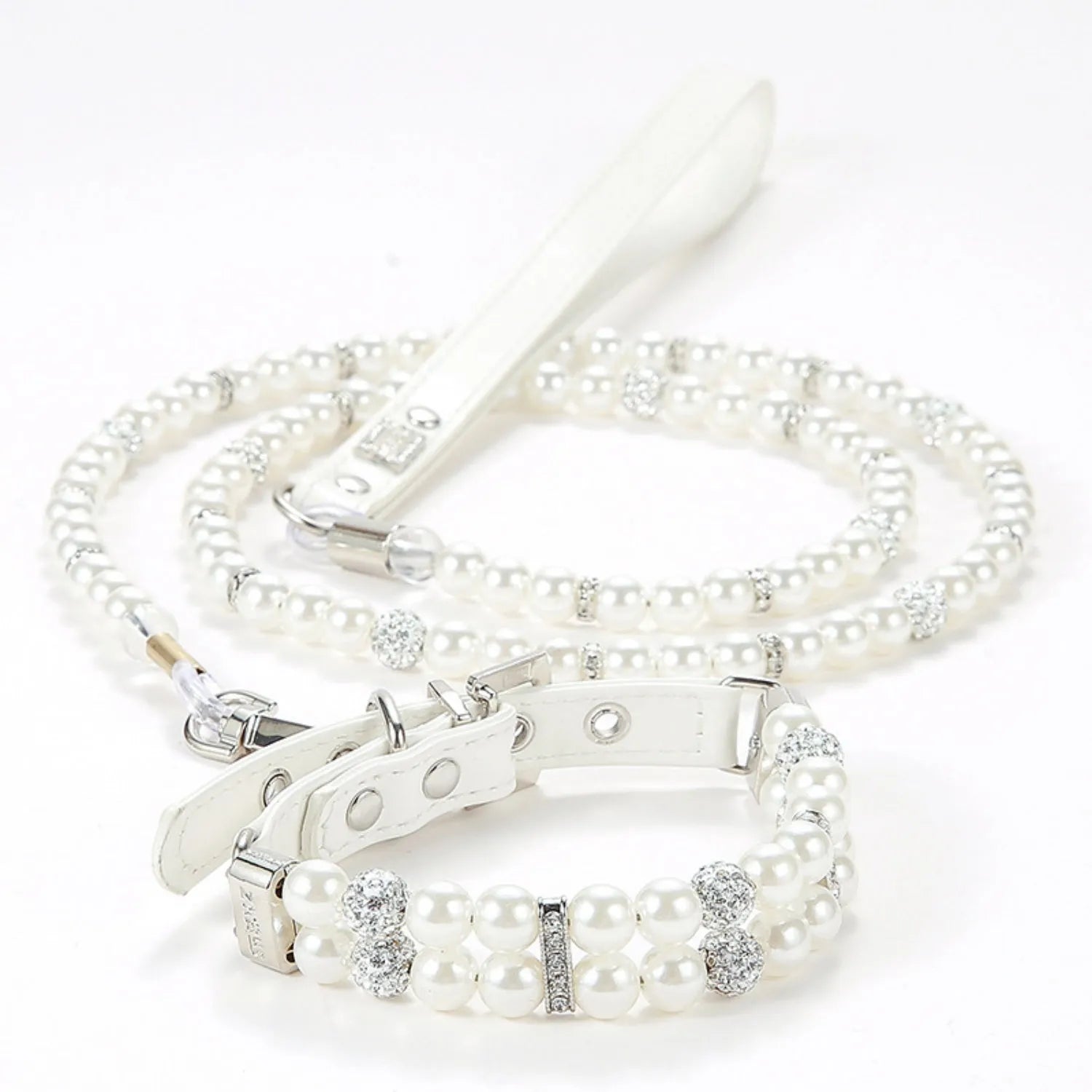 An elegant white simulated pearl pet collar displayed together with a matching white pearl leash.